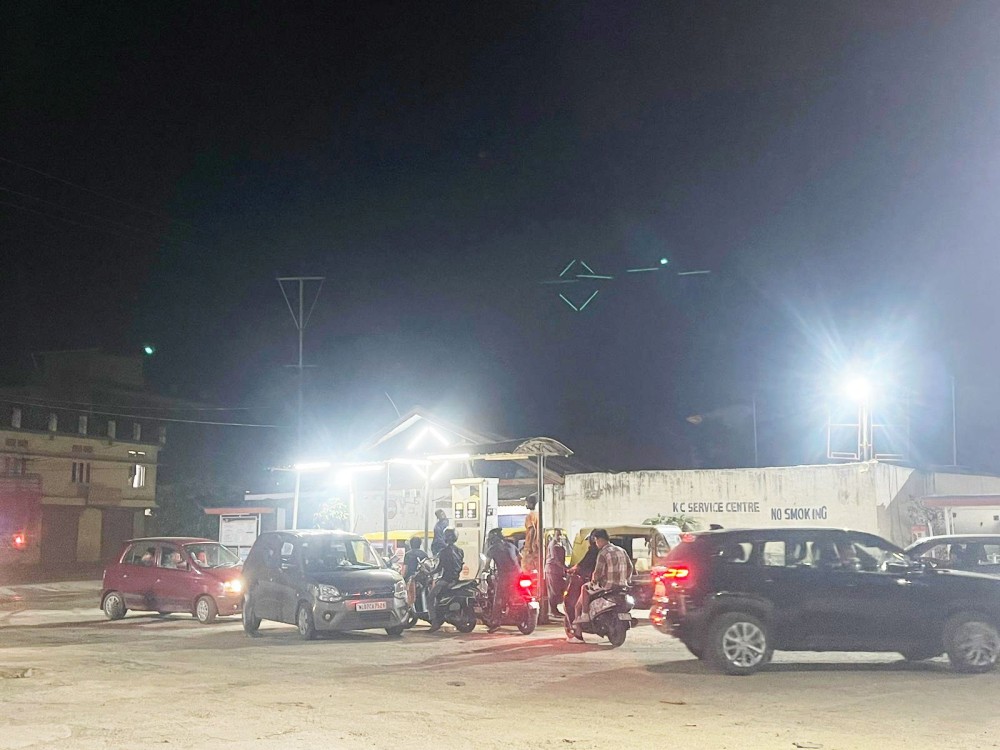 Commuters fill fuel at an oil station at Duncan Basti's Tajen Ao Road ahead of midnight revision of the prices of petroleum products on June 30. (Morung Photo)